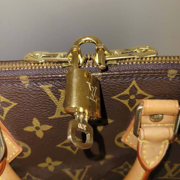 Pre-loved authentic 2004 Louis Vuitton PM Alma - Picture 4 of 8